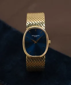 Patek Philippe Golden Ellipse 4226 Manual winding 23mm Female Replica Watch - Blue Dial, Yellow Gold Case